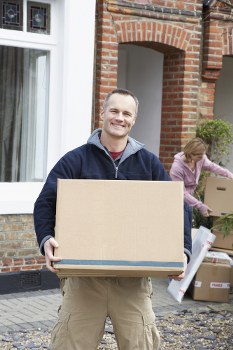 Professional flat removal team loading boxes in Hackney