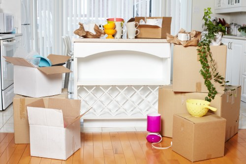Careful loading of bulky household furniture in Hackney