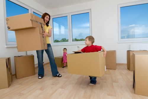 Safe piano lifting and wrapping during a Hackney relocation