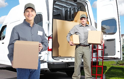Packed boxes and furniture ready for a same day move in Hackney