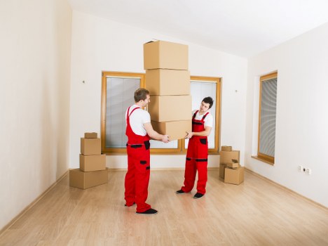Staff applying safety procedures during a property move